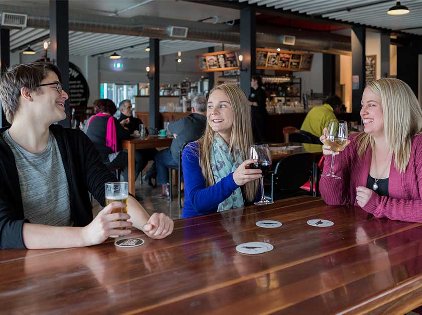 People enjoying a drink at Thirsty Crow Brewery in Wagga Wagga
